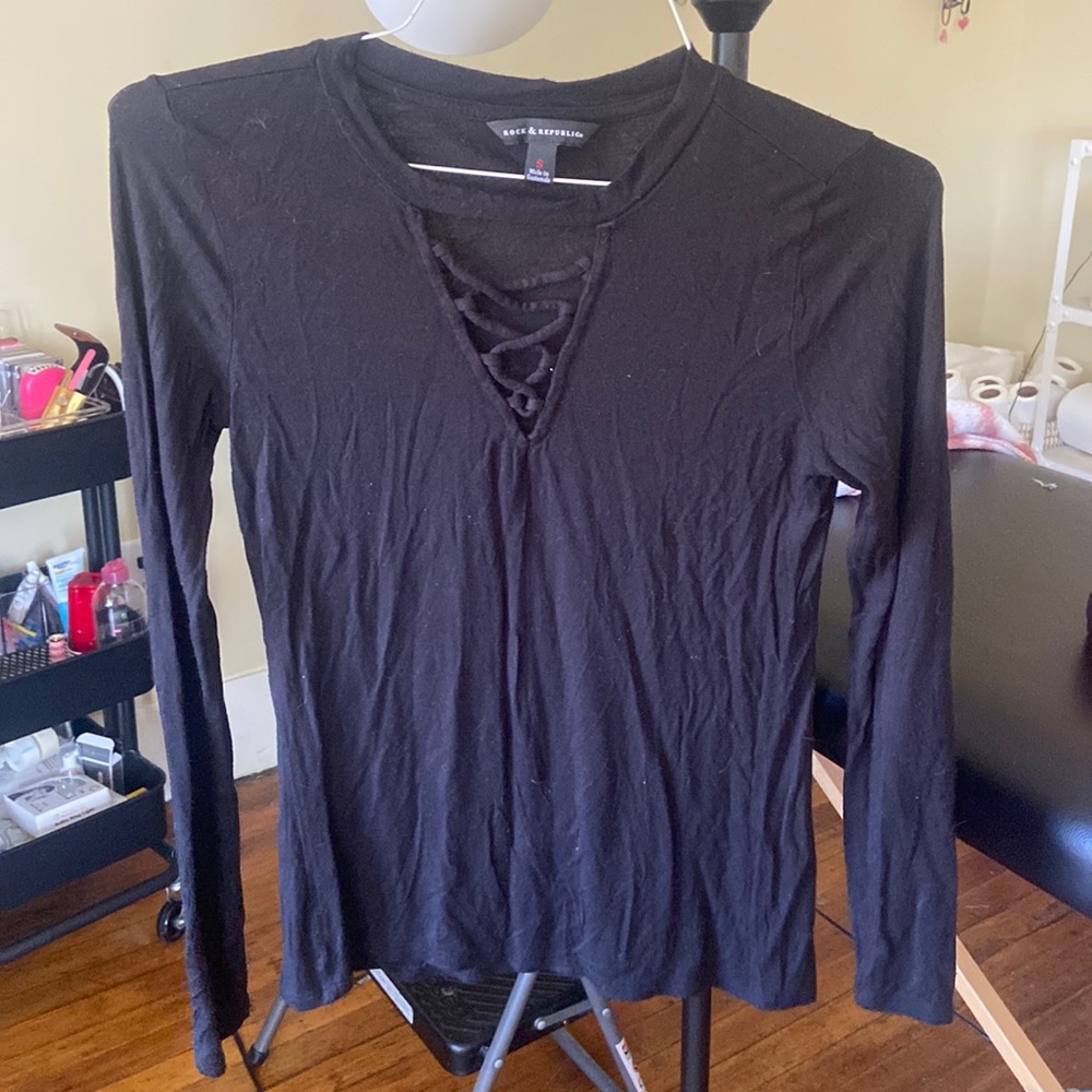 Black long sleeve criss cross chest decal
